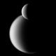 Illustration for article titled Saturns two largest moons, captured in tandem
